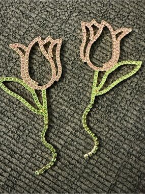 FREE Betsey Johnson Pink/Green Tulip Crystal Drop Earrings with $400 purchase.